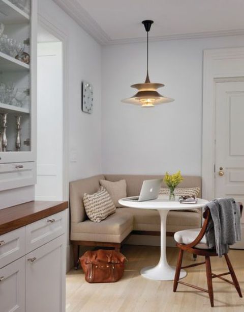 2-15-a-cozy-eating-space-in-a-small-corner-a-corner-sofa-and-an-eye-catchy-hanging-lamp-over-it