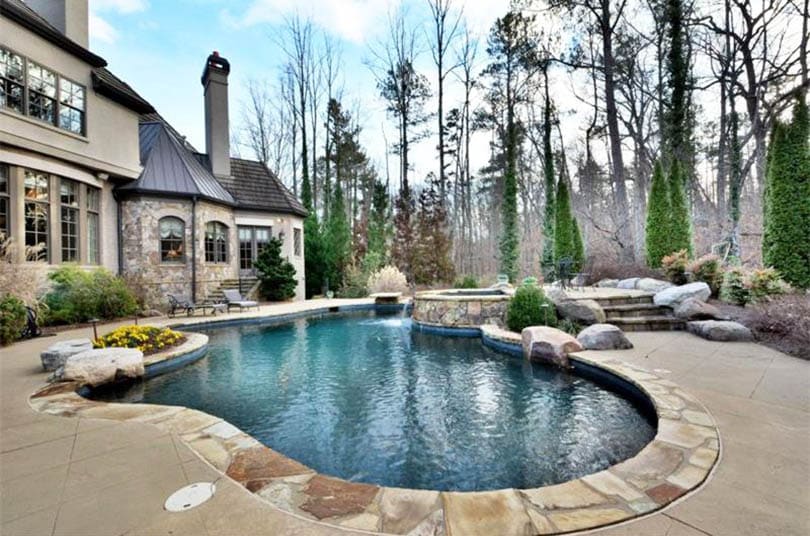 2-mountain-pond-swimming-pool-design-with-rock-border-and-spa