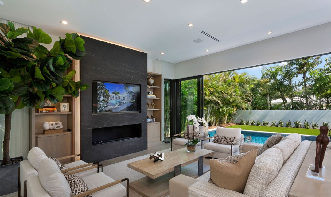 Black-marble-fireplace-and-large-open-window