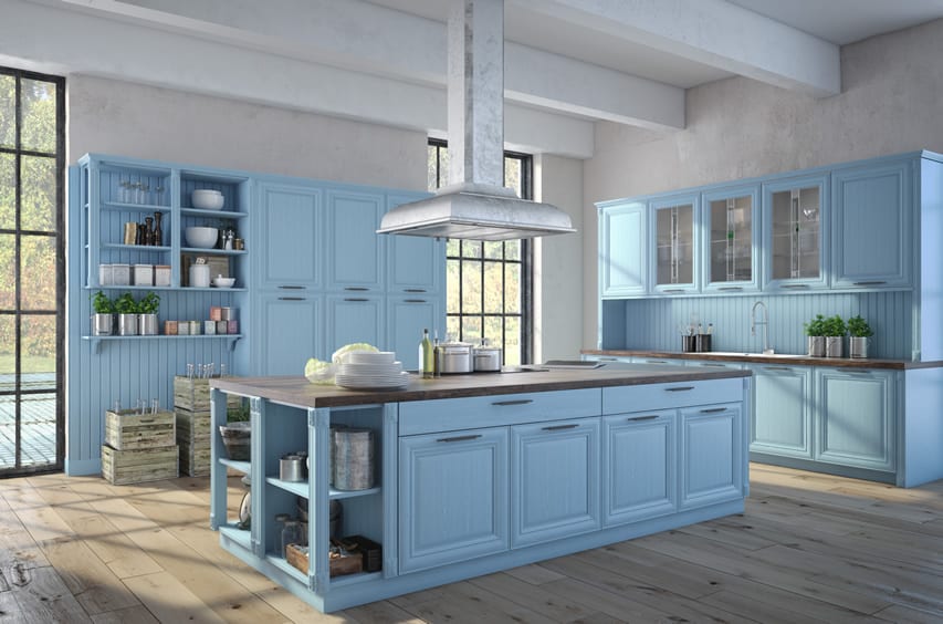 Blue-color-country-kitchen-with-wood-flooring