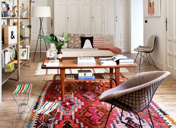 Ethnic-rug-in-living-room-interior-design-wall-shelves