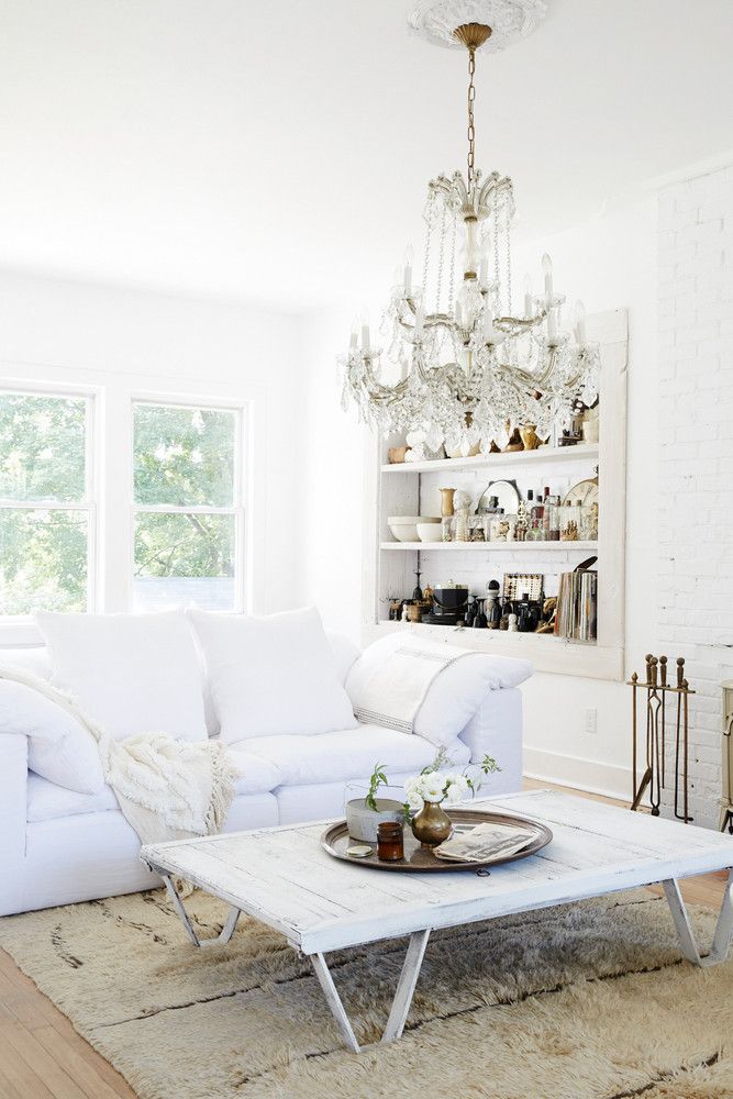 Farm-house-fresh-bronze-and-white-living-room-58de8e52890a84749952081a-w1000-h1000-1547496811