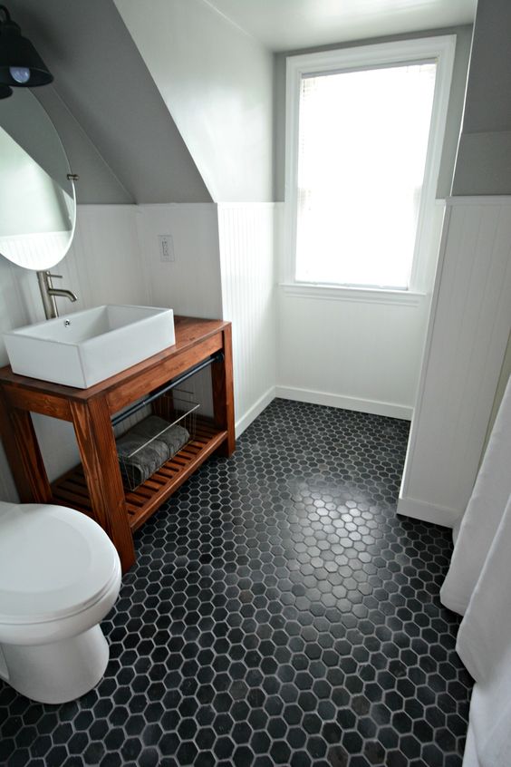 03-black-hex-tiles-make-a-statement-in-this-neutral-bathroom