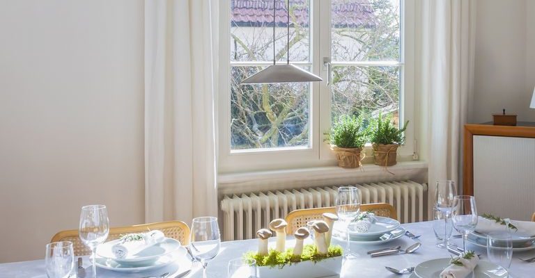1495675320-dining-room-table-windows-natural-light