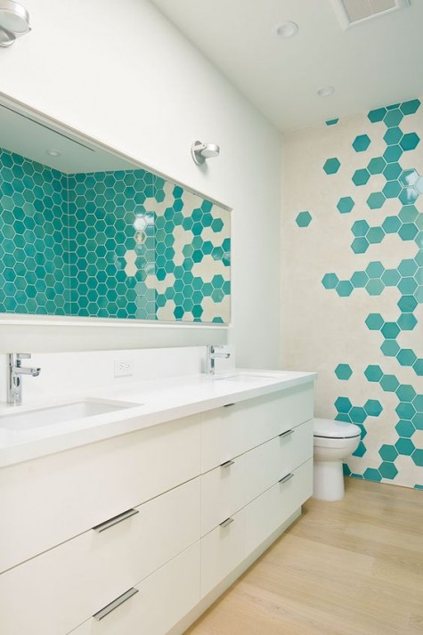 2-02-cream-and-turquoise-hex-tiles-on-the-wall-create-a-bold-mosaics-that-makes-the-space-unique-and-eye-catching