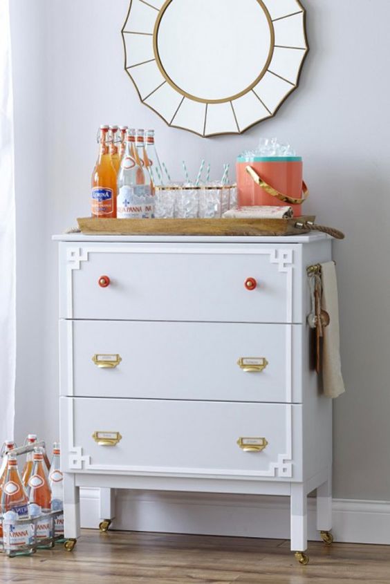 20-a-whimsy-ikea-tarva-hack-in-dove-grey-with-brass-and-red-knobs-plus-white-inlays-and-casters-makes-up-a-cool-home-bar