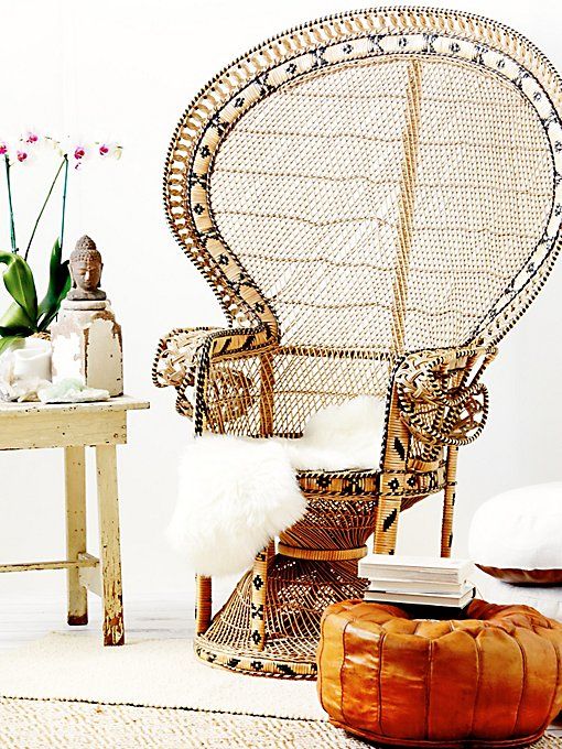 4-02-a-peacock-chair-with-yarn-wrapping-that-adds-a-print-to-it-an-amber-leather-ottoman-and-faux-fur-is-impressive