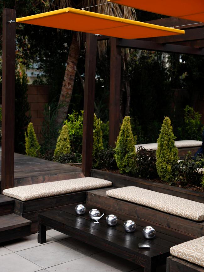 Horjd407_sliding-canvas-shades-orange_s3x4.jpg.rend_.hgtvcom.1280.1707