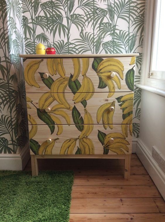 Ikea-tarva-hack-with-painted-bananas-andgold-knobs-is-a-playful-and-whimsy-item-for-storage