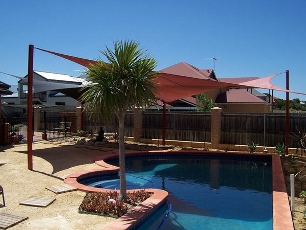 Pool-shade-ideas-sails-modern-patio-decoration-garden-fence