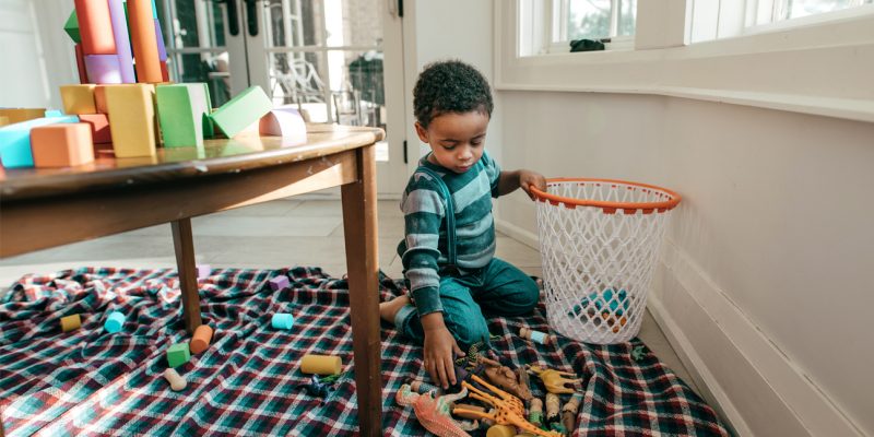 Child_picking-up-his-toys-1296x728-header