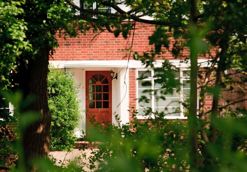 Front-door-to-home-in-suburban-england-royalty-free-image-1569925391