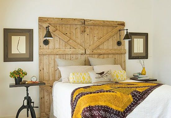 18-a-barn-door-used-as-a-headboard-in-this-bright-bedroom-features-lamps-and-add-a-cozy-rustic-touch