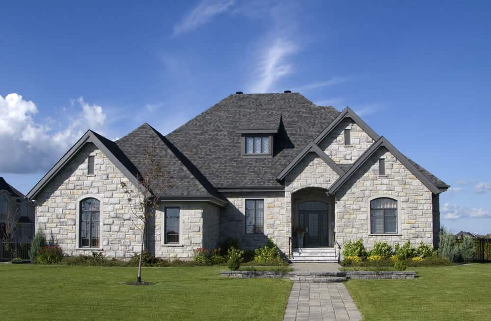 2-dark-gray-roof-stone-house-081018