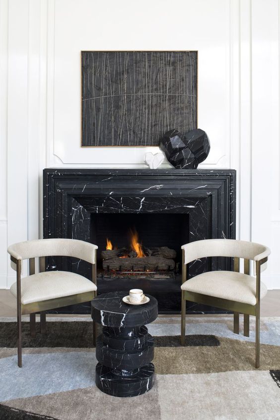 20-a-catchy-fireplace-nook-with-a-black-marble-clad-fireplace-refined-chairs-and-a-black-marble-side-table