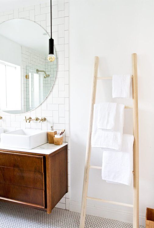 23-a-simple-wooden-ladder-with-some-towels-is-a-cool-space-saving-towel-storage-idea-for-every-kind-of-bathroom