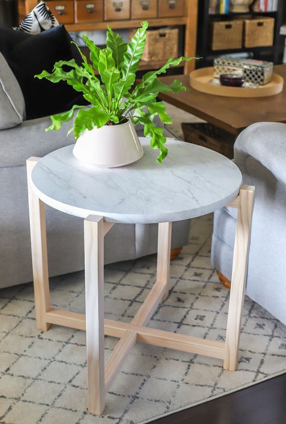 24-a-stylish-side-table-or-plant-stand-with-wooden-legs-and-a-white-marble-tabletop-is-a-stylish-idea