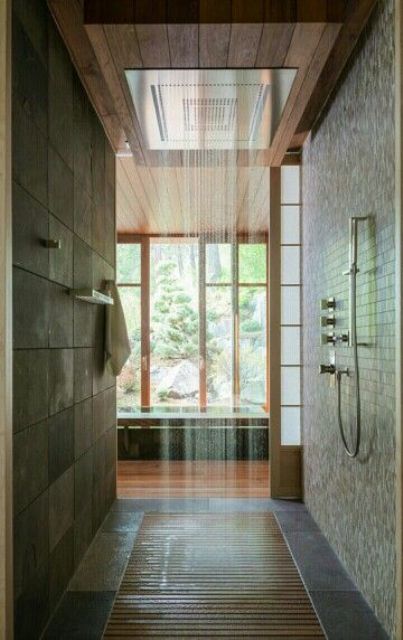 26-east-inspired-walk-in-shower-with-wooden-floor-and-a-rain-shower