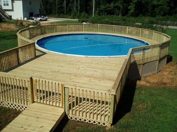 Above-ground-pools-with-decks-garden-pool-design-wooden-deck-and-railings