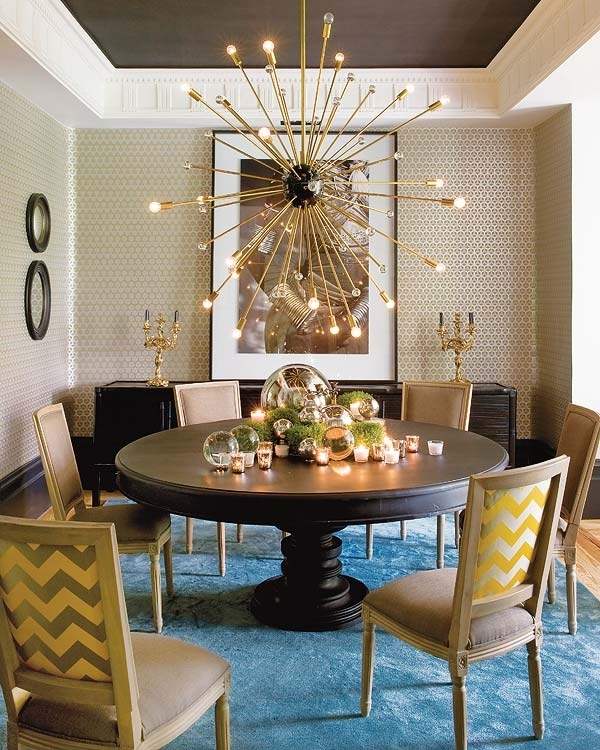 Dining-room-design-ideas-round-table-blue-carpet-sputnik-chandelier