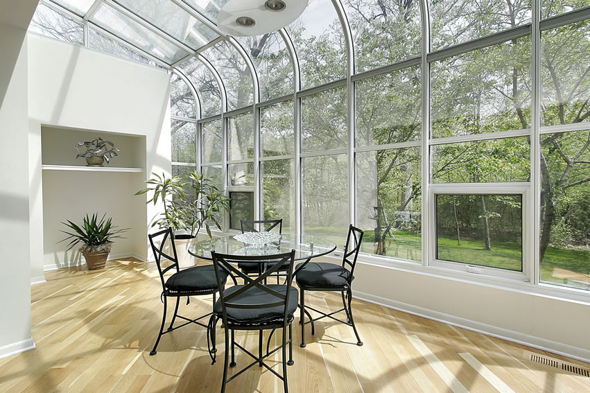 Glass-sun-room-with-nature-view