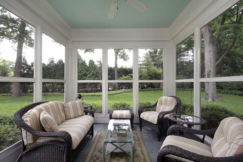 Sun-room-with-many-windows-and-garden-view
