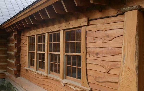 Vinyl-log-cabin-siding-pros-and-cons-of-vinyl-siding-vs-wood-siding