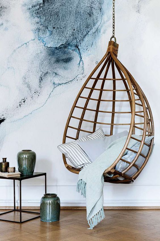 03-a-rattan-hanging-chair-can-make-a-bold-statement-in-any-modern-space