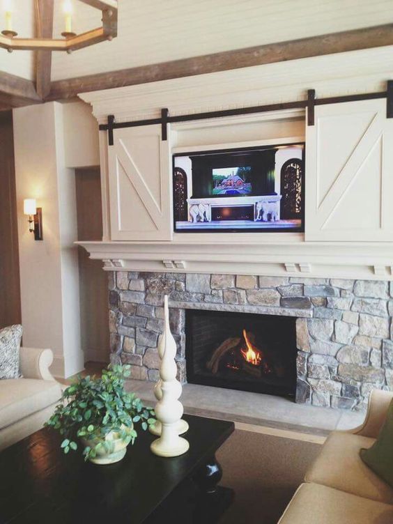 1-barn-doors-for-a-wall-mounted-tv-above-the-fireplace