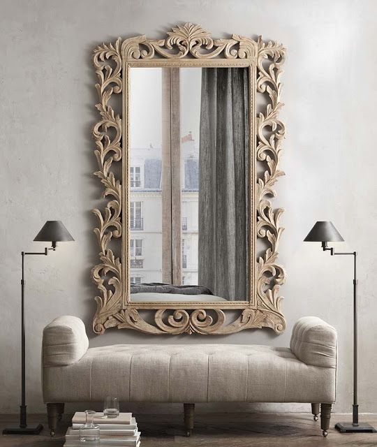 15-a-mirror-in-a-carved-wooden-frame-with-vignettes