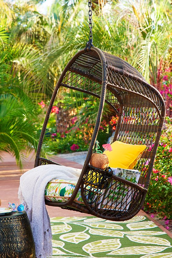 16-dark-swinging-hanging-chair-with-a-cushion-for-an-outdoor-space