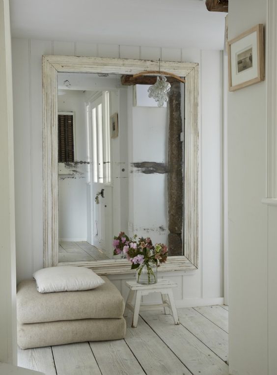 17-an-oversized-mirror-in-a-whitewashed-frame-for-a-scandinavian-entrance