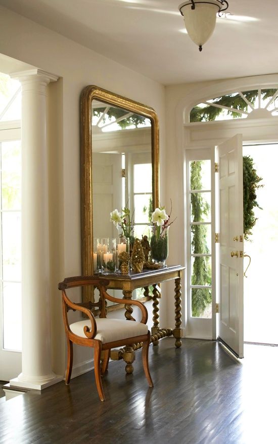 18-an-oversized-square-mirror-with-rounded-corners-and-a-vintage-feel