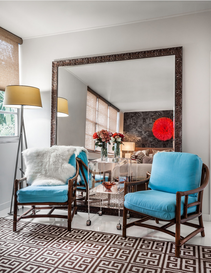 Freestanding-mirrors-in-contemporary-master-bedroom-in-miami-with-white-walls-and-porcelain-floors