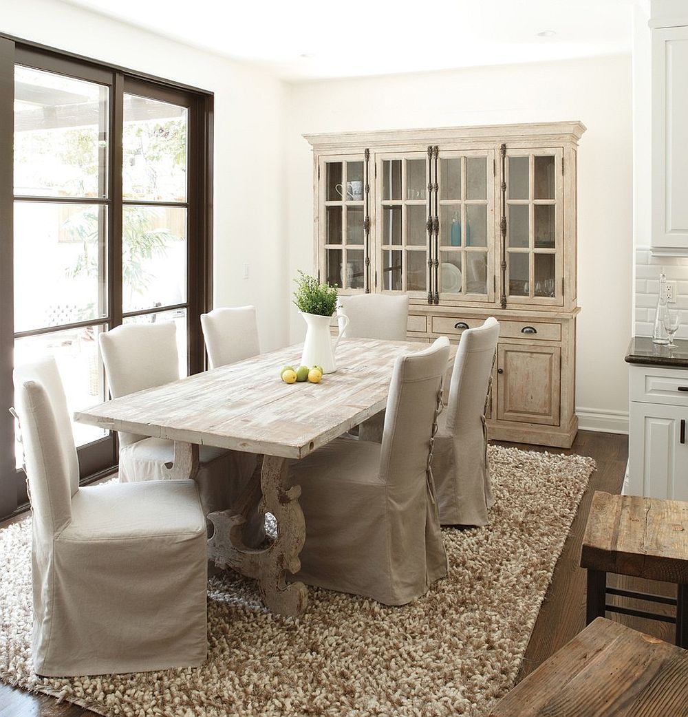 French-country-style-dining-room-with-a-stylish-hutch-and-dining-table-in-wood