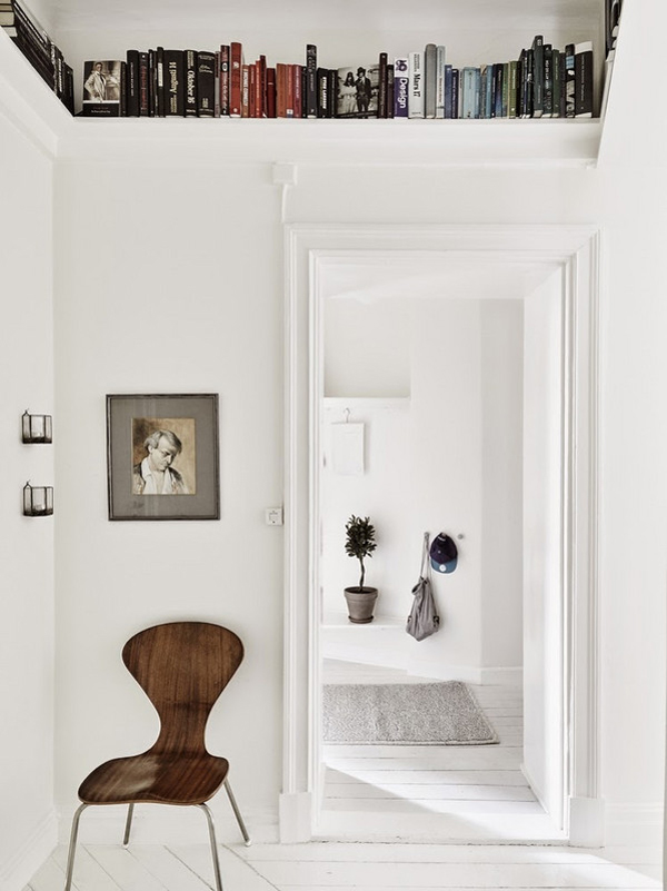 Above-door-book-storage-for-small-spaces
