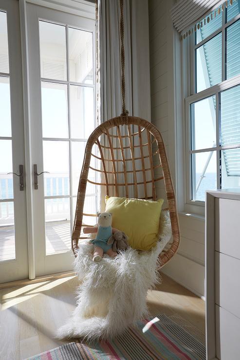 Boys-room-corner-hanging-rattan-chair