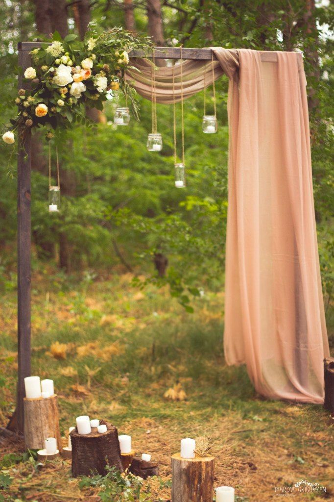 Creative-wedding-arch-ideas-with-florals-manson-jar-lights-and-drapery1