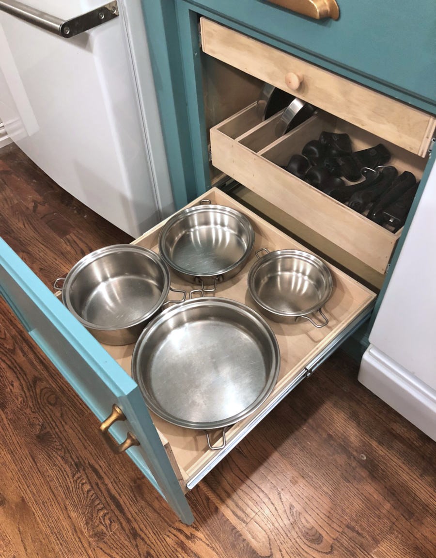 Organized-and-customized-pul-out-shelf-for-cookware-lower-shelf-with-four-most-used-pots-and-pans