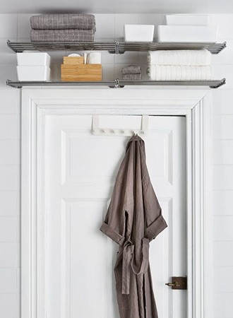 Shelf-above-bathroom-door-bathroom-storage-ideas