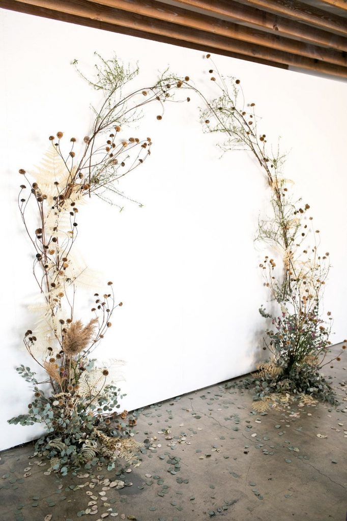 Unique-wild-weedy-wall-wedding-backdrop-ideas-682x1024-1
