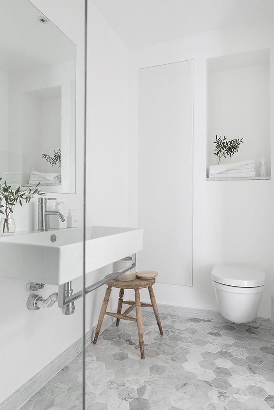 06-marble-hexagon-tiles-spruce-this-simple-bathroom-a-little-bit