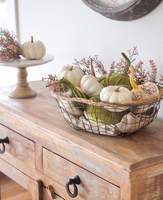 07-a-metal-basket-with-real-and-velvet-pumpkins-and-gourds-and-some-wildflowers