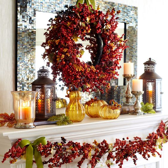 07-glass-pumpkins-berry-wreath-leaf-garland-candles