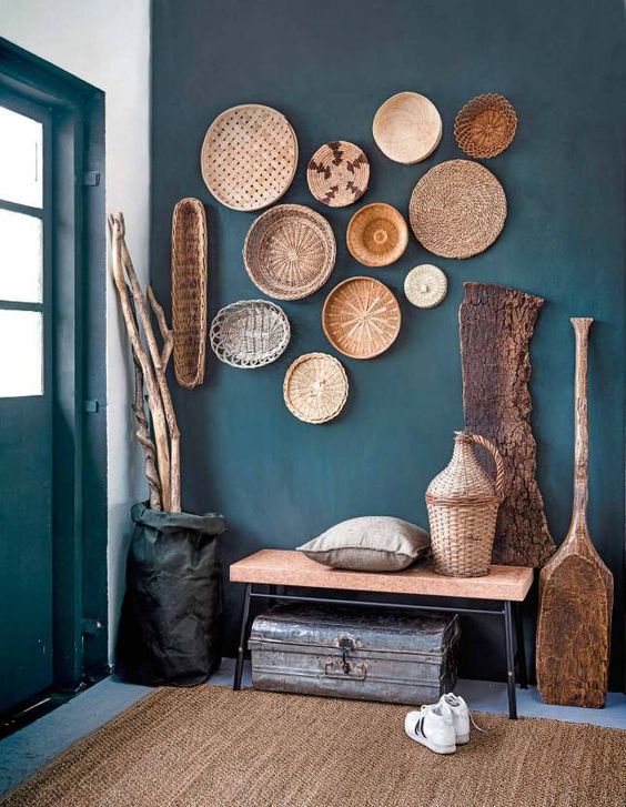 08-a-teal-wall-and-cool-baskets-that-echo-with-a-jute-rug-and-a-cork-bench