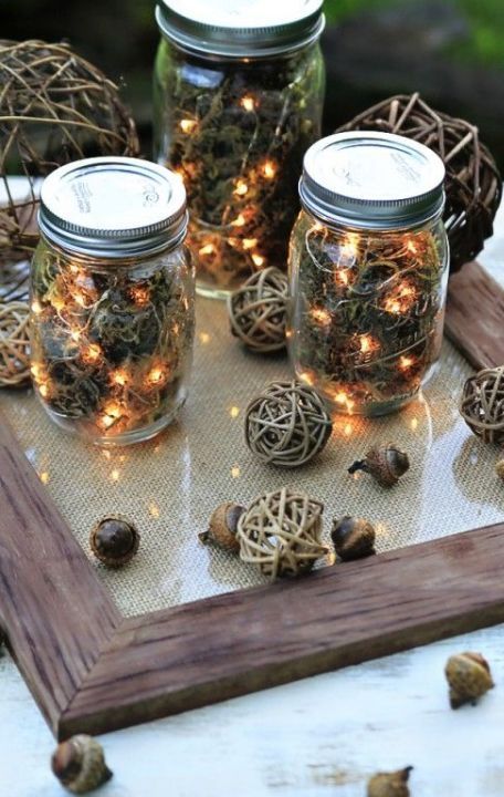 11-use-dried-moss-acorns-and-string-lights-to-craft-these-rustic-lanterns-1