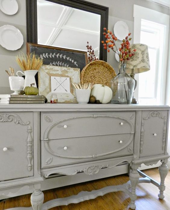 13-a-grey-farmhouse-console-table-with-faux-pumpkins-acorns-nuts-wheat-and-dried-flowers