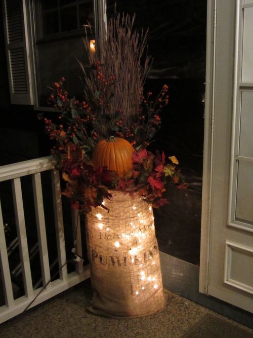 21-lights-in-a-burlap-sack-which-contains-a-bold-fall-arrangement-1
