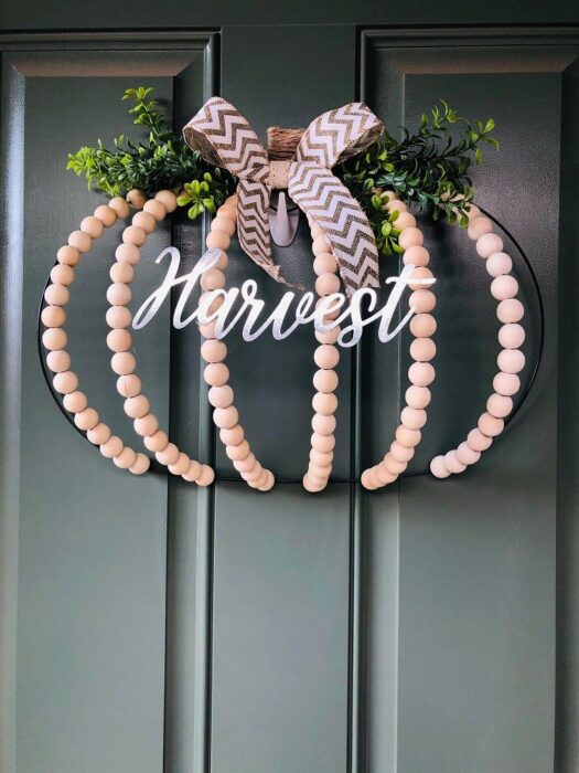 Dollar-tree-pumpkin-wire-wreath-using-wood-beads-525x700-1