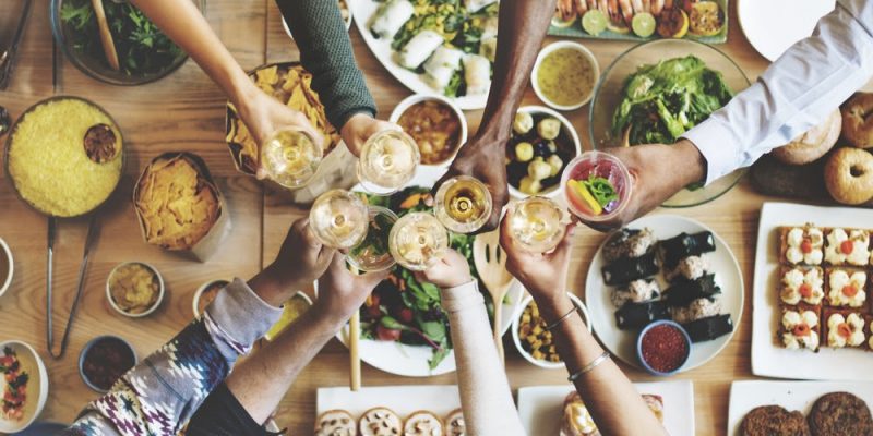 Friends happiness enjoying dinning eating concept